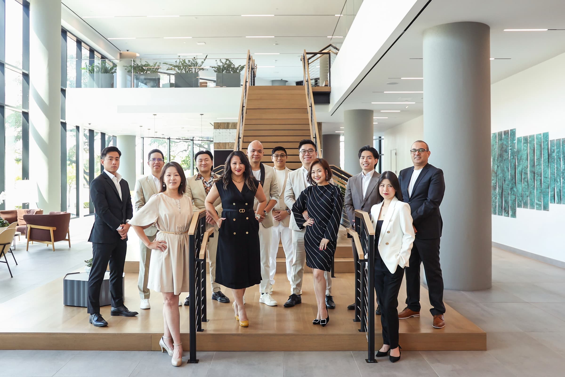 The CGP Realty Group team in their Houston lobby